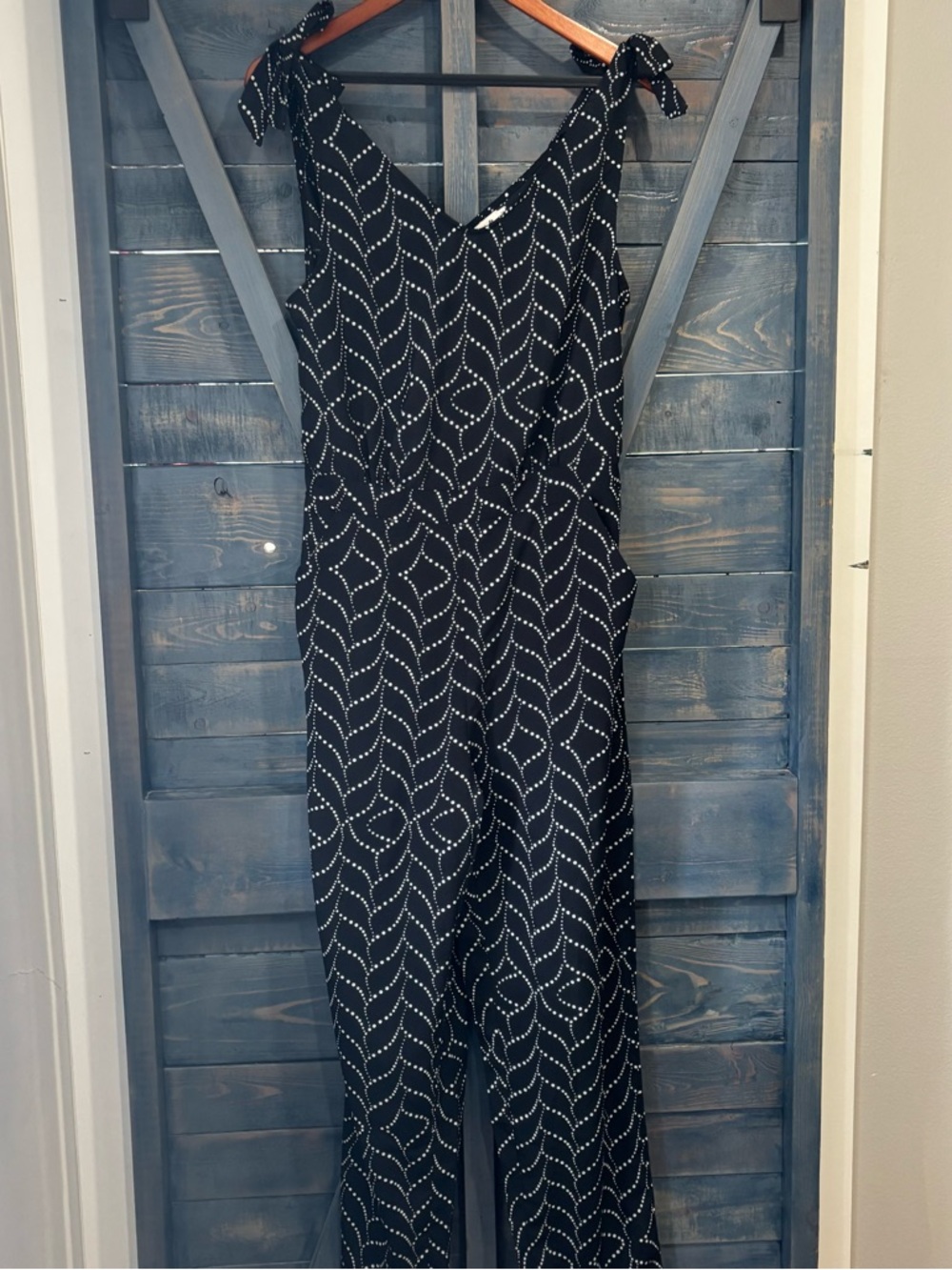 Molly Bracken Black Sleeveless Jumpsuit with White Dot Wave Pattern